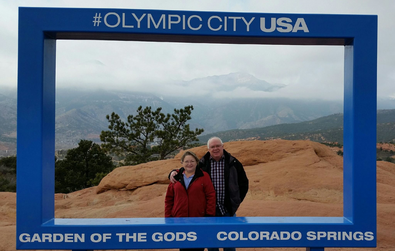 gallery/carol and carl with sign